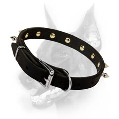 Custom made leather dog collar is constructed of  superior materials