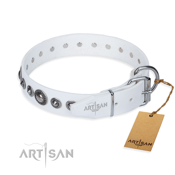 Leather dog collar made of soft to touch material with durable studs