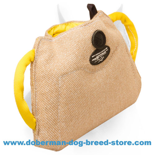 Doberman Puppy and Young Dog Bite Builder of Strong Jute Material